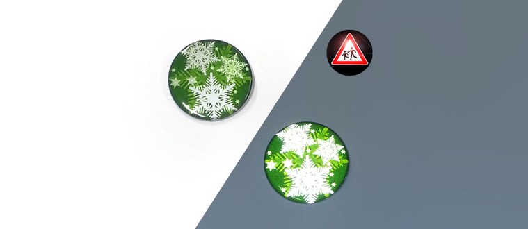 Reflektorbutton mit Schneeflocken, grün