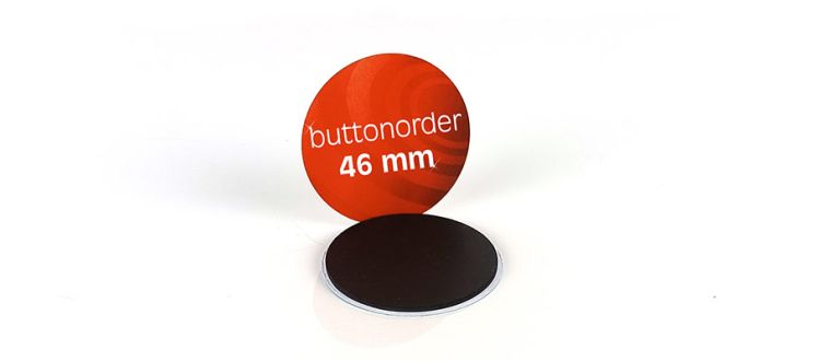 Öko-Buttons als Kühlschrankmagnet