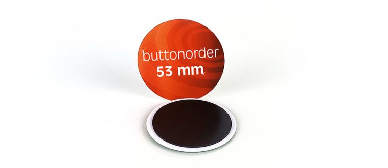 Öko-Buttons als Kühlschrankmagnet