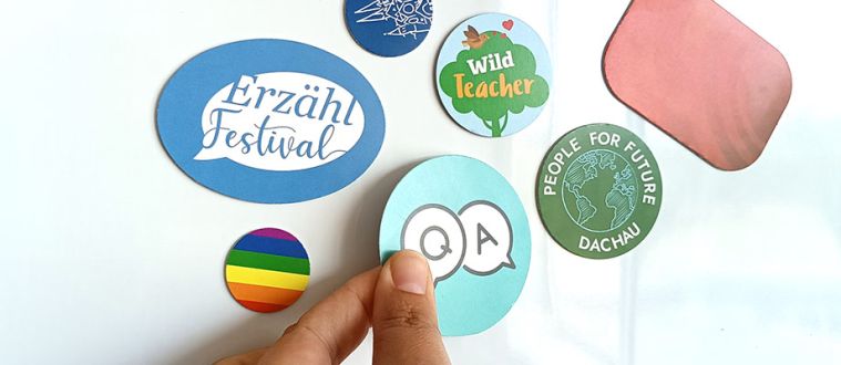 Öko-Buttons als Kühlschrankmagnet