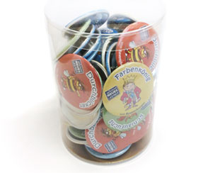 badges in a cup