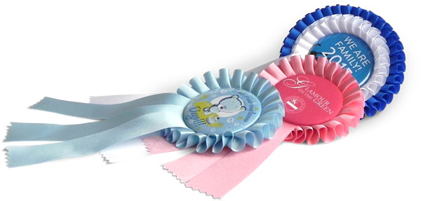 Rosettes with button, ribbon, winner badge